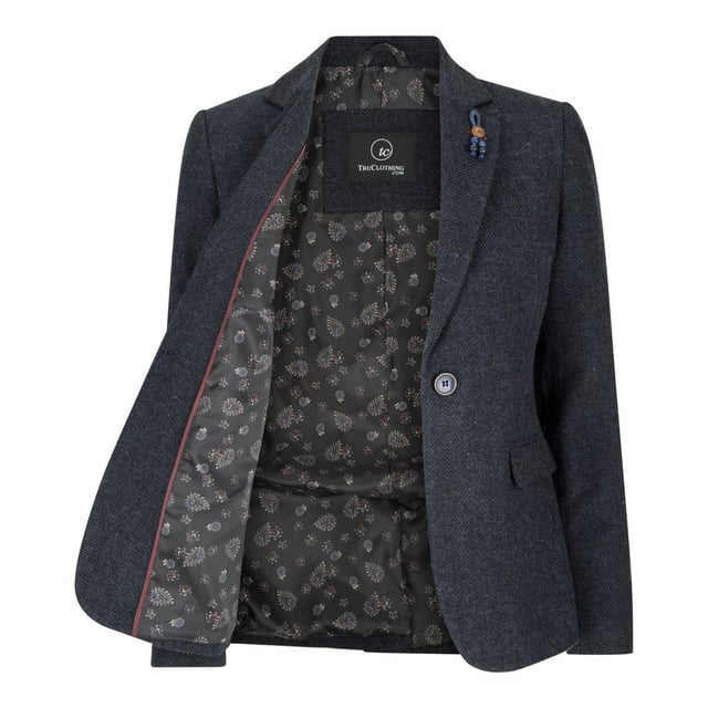 A sophisticated throwback to a timeless classic, this retro women's tweed blazer jacket is a perfect addition to any wardrobe. Made from premium wool with a herringbone design and contrast elbow patches with contrasting stitching, this blazer will offer a touch of refinement to any outfit. Crafted using a half canvas construction that moulds to your body shape the more you wear it, with flap pockets and buttoned cuffs, this jacket will be something that you will look your best in year after year. Perfect for sophisticated casual, formal events and themed occasions, there are no better tweed jackets for your wardrobe.A sophisticated throwback to a timeless classic, this retro women's tweed blazer jacket is a perfect addition to any wardrobe. Made from premium wool with a herringbone design and contrast elbow patches with contrasting stitching, this blazer will offer a touch of refinement to any outfit. Crafted using a half canvas construction that moulds to your body shape the more you wear it, with flap pockets and buttoned cuffs, this jacket will be something that you will look your best in year after year. Perfect for sophisticated casual, formal events and themed occasions, there are no better tweed jackets for your wardrobe.