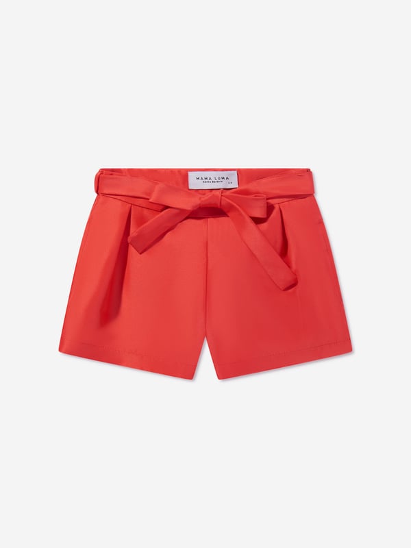 Mama Luma take inspiration from a bygone era with their refined handmade abstracts. These girls red shorts capture the Californian label's dedication to high quality and impeccable craftsmanship. Envisioned with stripes, a beautiful tie-up bow on the waist and side pockets. She will embody unparalleled sophistication. ‚ 100% Polyester