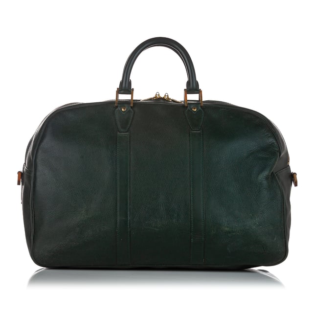 VINTAGE. RRP AS NEW. The Kendall GM features a taiga leather body, rolled leather handles, and a top zip closure.Exterior back is discolored, out of shape and scratched. Exterior bottom is discolored and scratched. Exterior corners is discolored and peeling. Exterior front is discolored, out of shape and scratched. Exterior side is out of shape. Screw is scratched and tarnished. Zipper is scratched and tarnished.

Dimensions:
Length 32cm
Width 45cm
Depth 22cm
Hand Drop 12cm
Shoulder Drop 80cm

Original Accessories: Shoulder Strap

Serial Number: SP0995
Color: Green x Dark Green
Material: Leather x Taiga Leather
Country of Origin: France
Boutique Reference: SSU103539K1342


Product Rating: FairCondition