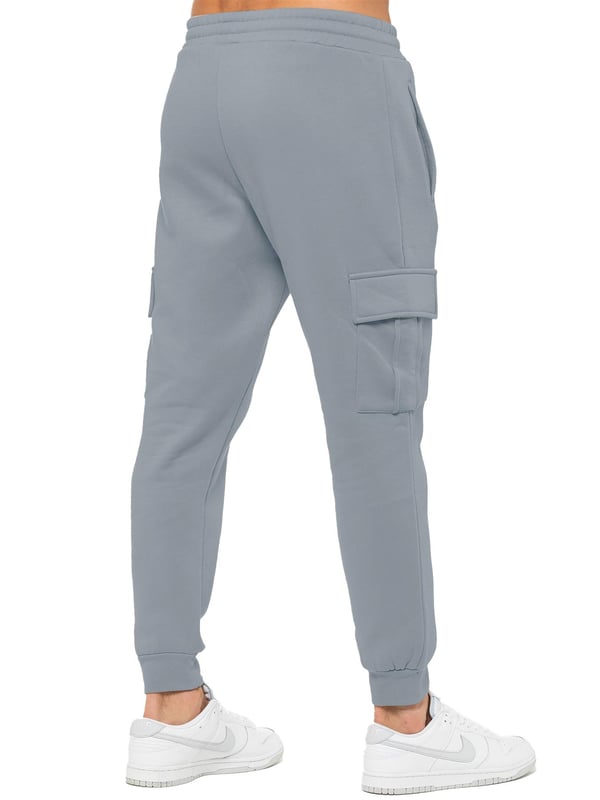 Enzo Mens Overhead Hoodie Tracksuit Set. Regular Fit, Long Sleeve Hoodie with Cuffed Wrists and Adjustable Drawstrings. Features EZ Logo On Chest And Joggers. Regular Fit Cargo Jogger. Elasticated Waistband With Adjustable Drawstring. Features 2 Side Slash Pockets, 2 Cargo Pockets, Single Welt Back Pocket. Ideal to use for Casual and Work wear.