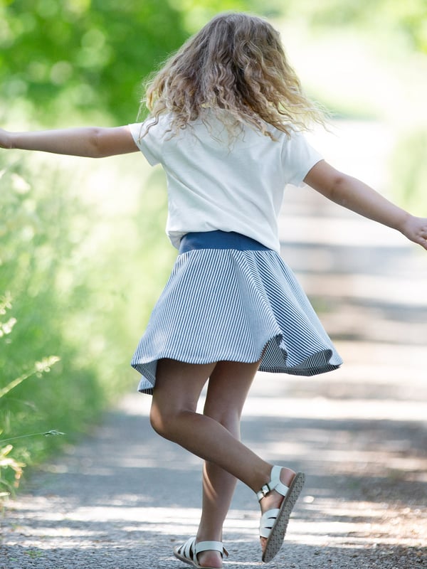 A wardrobe essential! A classic navy blue and cream stripy skirt with the lovely drape and twirl of Kite's much-loved skater dresses. Made with organic cotton rib fabric for a slight natural stretch and a wide, elasticated waistband with adjustable ties, this skirt is both comfy and stylish. Designed to pair with a variety of tops, this is a style to come back to time and again.