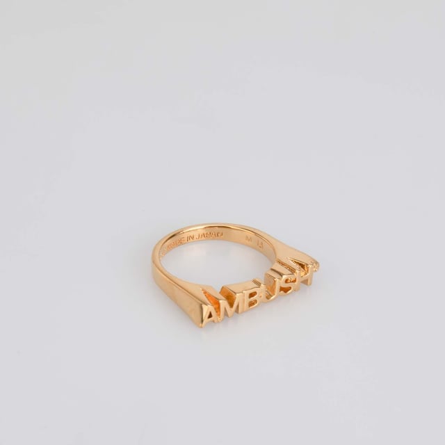 Ambush Nameplate Ring in Gold.- Large logo lettering.- 100% Brass. Ref: BWOC0220017600.