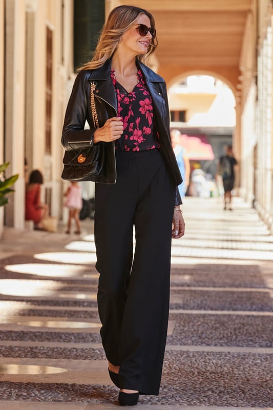 REASONS TO BUY:

Buy yourself flowers
Stylish and comfortable – every woman’s dream
From the tie neck to the fluted cuffs, it's all in the details
Sexy semi-sheer fabric
Separate cami for coverage
Style with skinnies or tuck it into a leather pencil skirt.