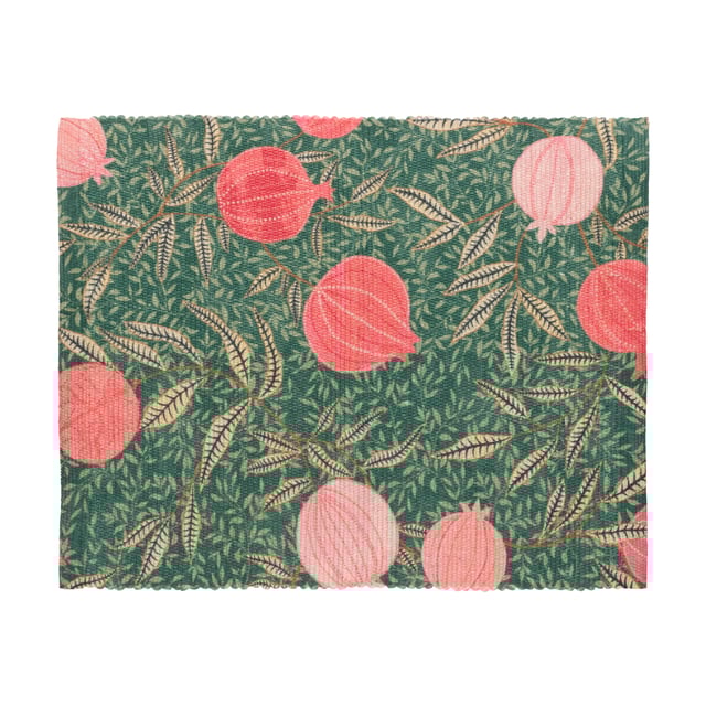Displayed in all its glory, the Pomegranate set of four placemats is the perfect addition to your home this festive period. Digitally printed for exceptional clarity on a durable woven polyester fabric, the opulent, juicy fruits intertwine with gold leaves, complimenting the warming green background. A refreshing alternative to traditional festive decor, this beautiful set brings richness to the Christmas dining table and will look fantastic all year-round.