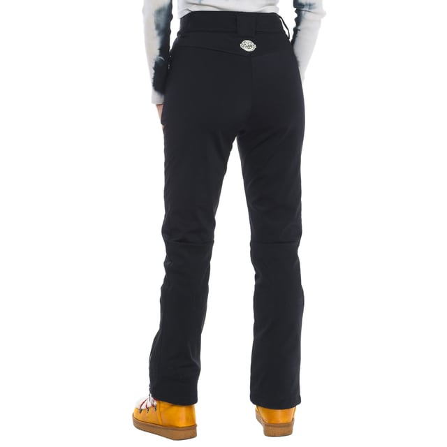 Ski pants Vuarnet.
 Front opening with zipper and snap button.
 Two zippered hand pockets
 Adjustable lower leg with zipper.
 Fixed inner gaiter with non-slip bands and reinforced material on the leg.
 Brand logo on the back.
 Seams seen in tone.
 Composition: 76% Polyamide, 24% Elastane
 Care:
Handwash.
 Do not use dryer.
 Do not iron.
 Do not use bleach.
 Do not dry clean.