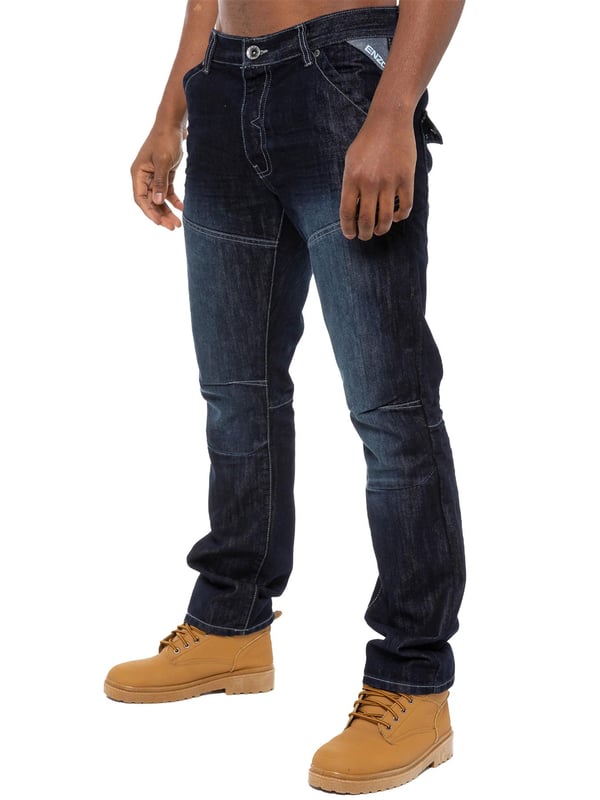 Turn up your style a notch with the latest midwash mens jeans. Enzo straight fit jeans in cotton blend blue denim feature a zip fly, double belt loops, seams at knee and thigh and back pockets with flaps. Straight leg jeans never go out of style and are perfect for relaxed weekends; tailored to sit just below the natural waist, they suit all figure types and with sizes up to 48, theres a pair of Enzo jeans to fit everyone. Also available in Blue, Grey and Black.