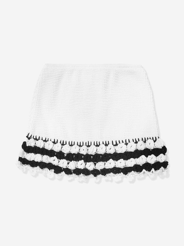 Nessi Byrd incorporate captivating materials into their everyday luxury swimwear. This girls Agave black girls skirt amplifies the New York label's passion for dynamic luxury and resortwear. Crafted with crochet accessories at the ends in a textured fabric and elasticated waistband. She will look and feel divine. Crochet Material 100% Cotton