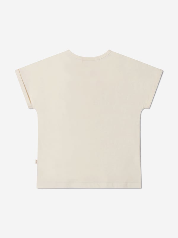 Introducing our Girls Organic Cotton Cherry Print T-Shirt from The Bonnie Mob in Pink, the perfect addition to your little girl's wardrobe. Made with love and care, this t-shirt is crafted from organic cotton, ensuring it is soft, comfortable, and gentle on her skin. Key Features: Made In Italy: This t-shirt is proudly made in Italy, guaranteeing the highest quality and attention to detail. Organic Cotton: We believe in sustainable fashion, which is why this t-shirt is made from organic cotton, reducing environmental impact. Cherry Print: The adorable cherry print adds a playful and cute touch to this t-shirt, perfect for your little girl. Flared Hem: Designed with a flared hem, this t-shirt offers a stylish and modern twist to a classic design. Long Waistband: The long waistband adds a touch of elegance and sophistication to this t-shirt. 'B' Motif: Featuring a golden 'B' motif, this t-shirt showcases The Bonnie Mob's signature logo, adding a touch of luxury to your little girl's outfit.Get ready to dress your little girl in style and comfort with our Girls Organic Cotton Cherry Print T-Shirt from The Bonnie Mob.