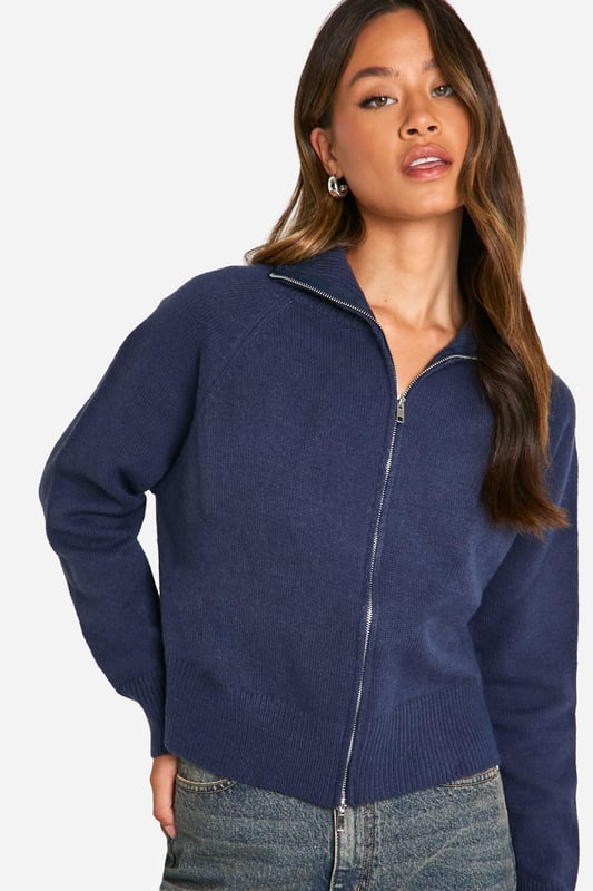 Funnel neck design for added warmth and style
        Full-length zip closure for versatile wear
        Ribbed cuffs and hem for a snug fit
        Cropped length perfect for high-waisted bottoms
        Relaxed fit through the body for comfort
    
    This tall cardigan from Boohoo is the ultimate casual wardrobe staple. The funnel neck design adds a contemporary twist to the classic cardigan silhouette, whilst the full-length zip allows for versatile styling options. Pair it with your favourite high-waisted jeans and trainers for a laid-back weekend look, or layer it over a dress for a cosy night in. The cropped length is ideal for showing off your waistline, making it perfect for casual events or family gatherings. For a trendy autumn ensemble, team it with wide-leg trousers and ankle boots, adding a baseball cap for an extra touch of cool. The relaxed fit ensures comfort without compromising on style, making this cardigan a go-to piece for those who want to stay fashionable whilst feeling at ease.