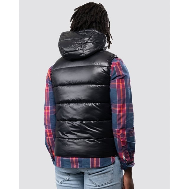 This sporty Water Repellent Puffer Hooded Gilet from HUGO is the perfect piece to elevate your wardrobe this season with sustainable style. Crafted from water-repellent recycled nylon and padded with sustainably sourced recycled fibres providing warmth and comfort. Featuring an insulated hood with full zip closure, elasticated binding and front zip pockets. Finished with a signature HUGO logo patch on the chest.Slim Fit, Water-Repellent Recycled Nylon Shell, Recycled Polyester Padding, Insulated Hood, Full Zip Closure, Twin Zip Front Pockets, Internal Zip Pocket, HUGO Branding. -Style & Fit:Slim Fit, Fits True to Size. Composition & Care:Shell: 100% Recycled Polyamide, Fill: 100% Recycled Polyester, Machine Wash.