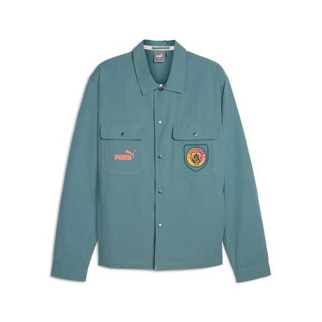 PRODUCT STORY: Marking 30 years of Definitely Maybe, its Definitely City. Co-designed by Noel Gallagher, a lifelong Man City fan, this relaxed fit overshirt pays homage to an album that defined an era. FEATURES & BENEFITS: Made with at least 20% recycled cotton. DETAILS: Relaxed fit; 165gsm, seersucker; Collar; Button placket; Long sleeves; Official team branding details. Our model is 186 cm tall and is wearing size M UK.
