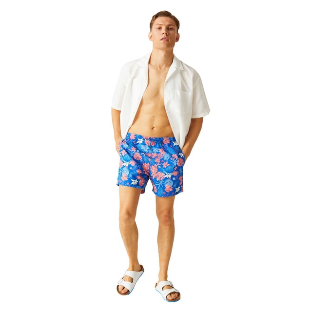 100% Recycled Polyester. Fabric: Microfibre, Seersucker. Design: Hawaiian, Logo, Printed. Pockets: 2 Side Pockets, 1 Back Pocket, 1 Security Pocket. Fastening: Pull-On. Fabric Technology: Durable, Lightweight, Quick Dry, Soft. Inner Brief. Length: Long. Waistline: Drawcord, Elasticated. Sustainability: Made from Recycled Materials.