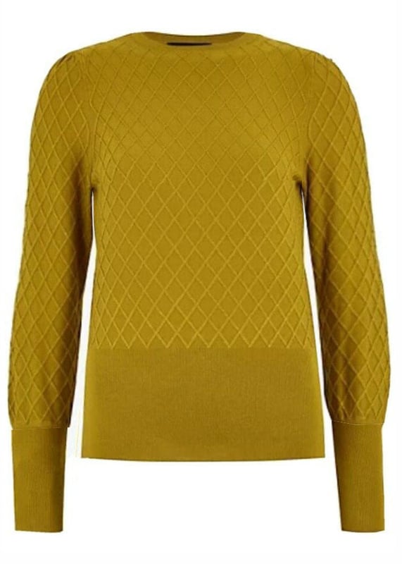 This jumper offers a contemporary twist on classic knitwear. Its modern shape is thanks to the large rib-knit cuffs and subtle diamond stitch pattern.

82% Viscose 18% Polyamide

Diamond Texture Knit
Crew Neck
21" Shoulder to Hem

Long Puff Shoulder Sleeve
Deep Ribbed Cuffs