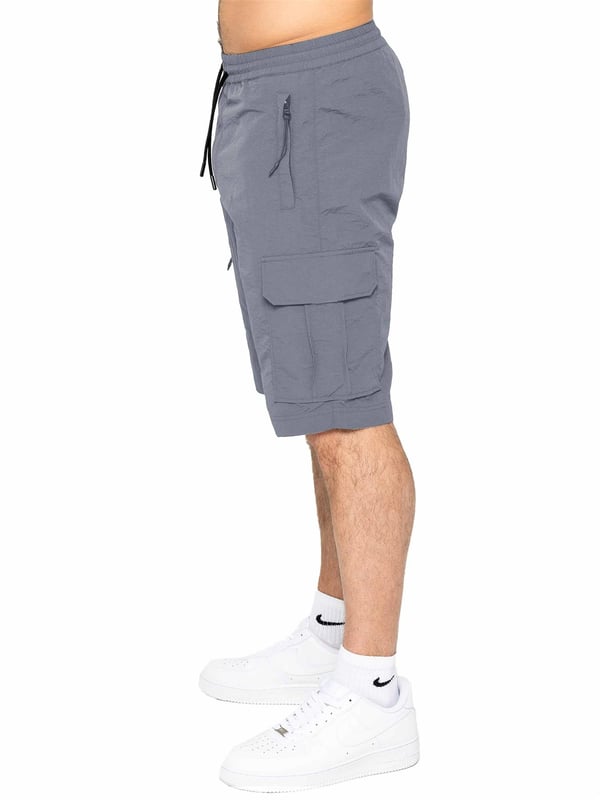 Engineered for comfort and versatility, these poly cargo shorts will elevate your casual wardrobe. Made from a durable woven crinkle fabric, they boast a relaxed elasticated waist and drawstring fastening for a perfect fit. Stay organized with zip-fastened side and leg pockets, adding a touch of utility to your summer ensemble. Pair with a classic t-shirt and trainers for effortless style.