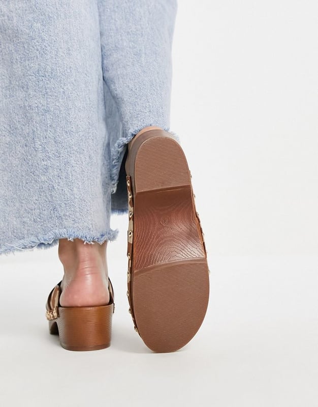 ASOS DESIGN Marleigh clog flat mules in tan cow printMulti