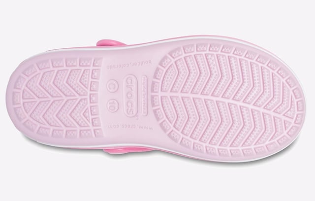 They will dazzle in our kids sandal with cute colours and a comfy fit. Jibbitz charm holes let them add a personal touch.
- Sporty Crocband style for little ones
- Croslite material cushions and comforts
- Heel and ankle strap for a more secure fit
- Comfort Rating: Iconic