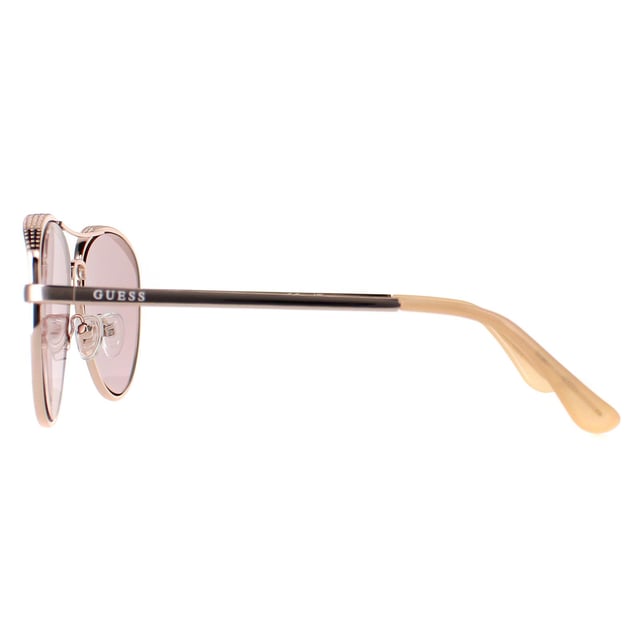 Guess Aviator Womens Shiny Rose Gold Bordeaux Mirror GF0350  Sunglasses are a stylish, aviator frame, that exude timeless glamour while providing optimal coverage and sun protection. Crafted from lightweight metal , these sunglasses ensure durability and comfort, making them ideal for any occasion.