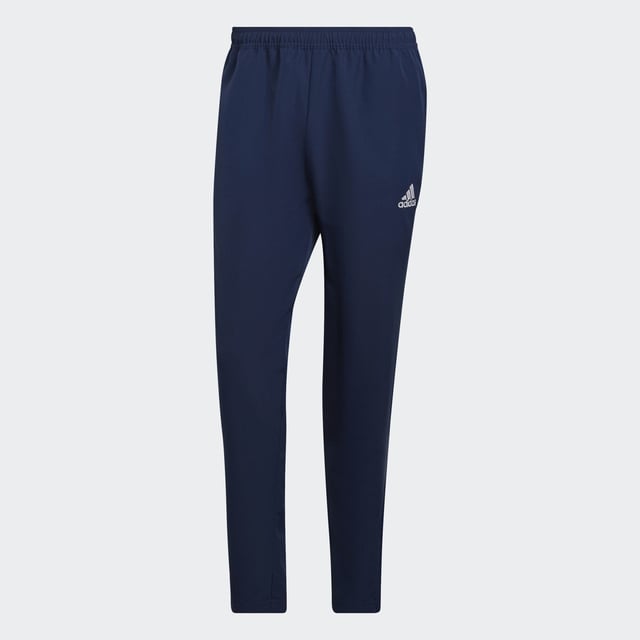 Part of the grassroots, football-focused Entrada 22 collection, these adidas pants were made to be seen. Clean and classic, they'll give your team a unified look on and off the pitch. Moisture-wicking AEROREADY keeps you comfortable. Ankle zips help you get them off quickly when it's time to do your thing.Made with 100% recycled materials, this product represents just one of adidas' solutions to help end plastic waste.  - This model is 186 cm and wears a size M. Their chest measures 99 cm and the waist 80 cm. - Regular fit with mid rise - Elastic waist with drawcord - 100% recycled polyester plain weave - Moisture-absorbing AEROREADY - Front zip pockets - Ankle zips  Shipped by adidas