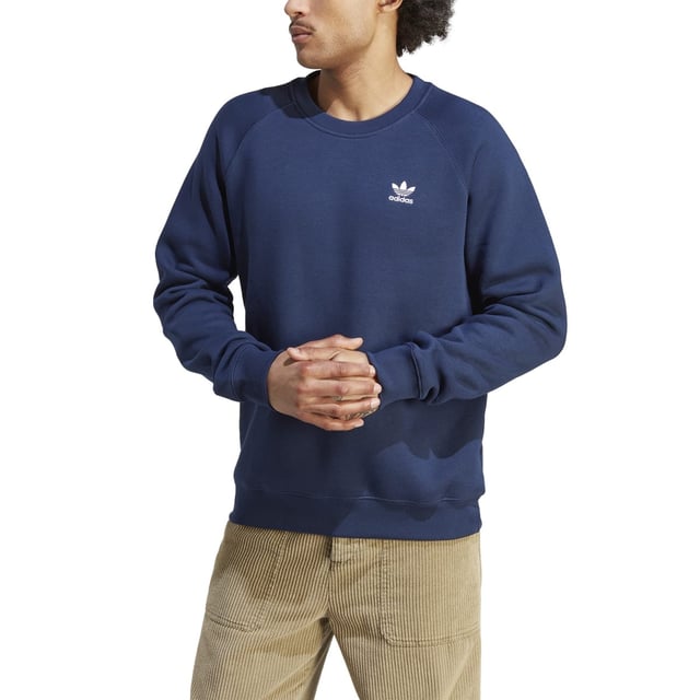 Mens adidas Originals Trefoil Essentials Crewneck Sweatshirt in navy.- Ribbed crewneck.- Ribbed cuffs and hem.- Small Trefoil logo.- Regular fit.- 70% Cotton  30% Polyester (100% Recycled).- Ref: IM4536