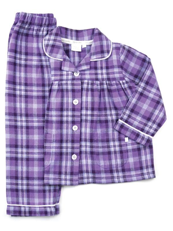 Girls Lilac and Purple Check Traditional Winter Pyjama Set. 

A timeless check is given the Mini Vanilla touch using lilac and purple tones in our kids pyjama set. Made from super-soft and cosy, brushed 100% cotton, the PJ set is trimmed in white cotton. The long-sleeved top has an open collar and fastens with engraved buttons. Fully elasticated at the waist the trousers have a comfy fit.

Our pure-cotton check pyjamas are a beautiful-quality addition to their nightwear collection. Our cotton flannel is brushed, making it unbeatably soft and cosy against the skin and plush to the touch. A great PJ gift for girls too!

Features
Button-through long-sleeved top
Classic Brushed Check Fabric
Contrast piping along collar and cuffs
Elasticated waistband
100% soft brushed Cotton
Machine Washable
Front pockets
Engraved pearl effect buttons