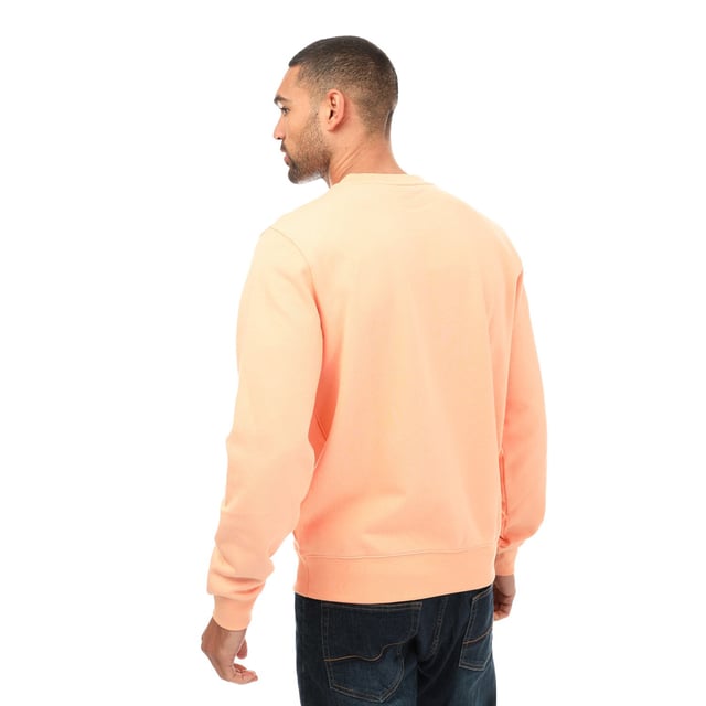 Men's Lacoste Crocodile Print Crew Neck Sweatshirt- Classic fit  natural ease:- Crew neck:- Lacoste lettering and oversised crocodile on front: - Embroidered crocodile on bottom: - Unbrushed cotton fleece: