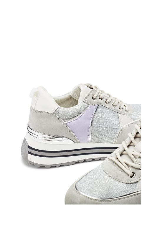 Create new looks in Chanella. This style features a wedge heel for added height and elevated look whilst the contrasting panels and metal details give this trainer a luxe feel.