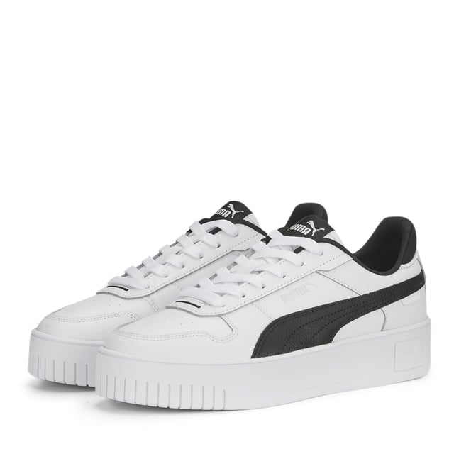 PRODUCT STORY: Streetwear-inspired design and a slightly elevated platform make these Carina's perfect for everyday outfits. FEATURES & BENEFITS: SOFTFOAM+: Step-in comfort sockliner designed to provide soft cushioning thanks to its extra thick heel; Recycled Content: The upper of this shoe is made with at least 20% recycled materials as a step toward a better future; DETAILS: Leather upper; Rubber midsole; Rubber outsole; PUMA Formstrip on the medial and lateral sides; PUMA Cat Logo on the heel;