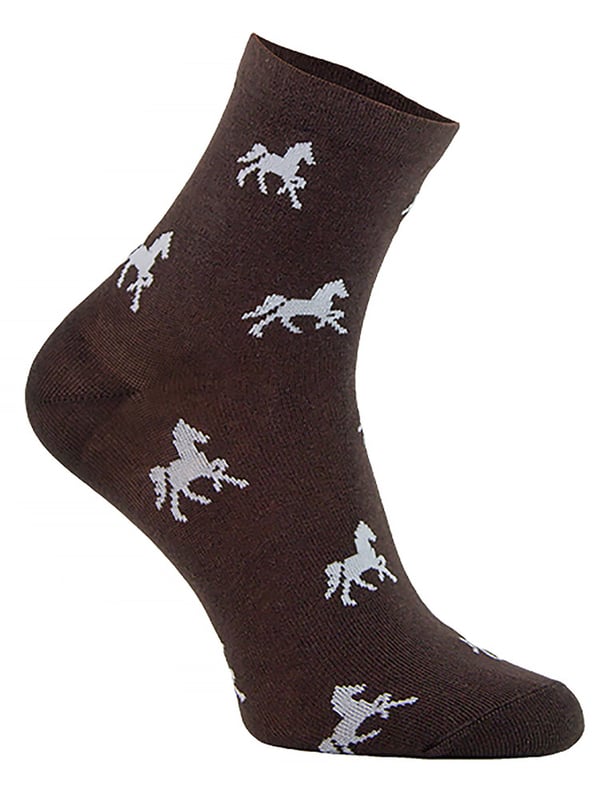 COMODO - Ladies Low Cut Equestrian Ankle SocksComodo has been providing high-quality socks for men and women since 1996. They sell a range of socks for hiking, cycling, hunting, skiing, and now, horse riding! Whichever type of socks you wear, your feet are bound to feel comfortable and warm, no matter the weather or environment!These specific socks are designed for horse riding and are ideal for the summer months, but they're also perfect if you just want to stay comfortable while looking cute. These socks are made from cotton rich fibres which means they are very soft and make sure to keep your feet comfy during your afternoon ride.They come in five different colours which are: Black, Navy, Grey, Brown and Fuchsia and also feature cute horse patterns that are sure to bring a smile to the face of any horse lover. Comodo riding socks are sure to look great and maintain their condition wear after wear.They're lightweight and soft on the skin, perfect for wearing all day long! The soft touch cotton material also helps to wick away moisture and sweat, especially if you’ve been horse riding for longer hours in the summer.These socks are made from 70% Cotton, 25% Polyamide, 5% Elastane and come in 5 colour options. They are available in 2 sizes: 3-5 UK, 4-8 UK and are Machine Washable.Extra Product DetailsLadies Equestrian SocksLow Cut Ankle LengthCotton Rich FibresDesigned For Horse RidingIdeal For The Summer MonthsSoft & Comfortable5 Colours AvailableCute Horse Patterns70% Cotton, 25% Polyamide, 5% Elastane2 Size OptionsMachine Washable