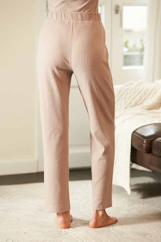 REASONS TO BUY: 

Pyjama-level comfy
Soft-touch fabric feels amazing
Wide-leg style
Elasticated waist for extra comfort
Wear with the matching top for luxe lounging
Take them outside with a biker and trainers
