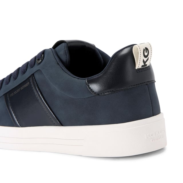 The Noah is a navy sneaker. The front laces up with black hardware across the shoe.