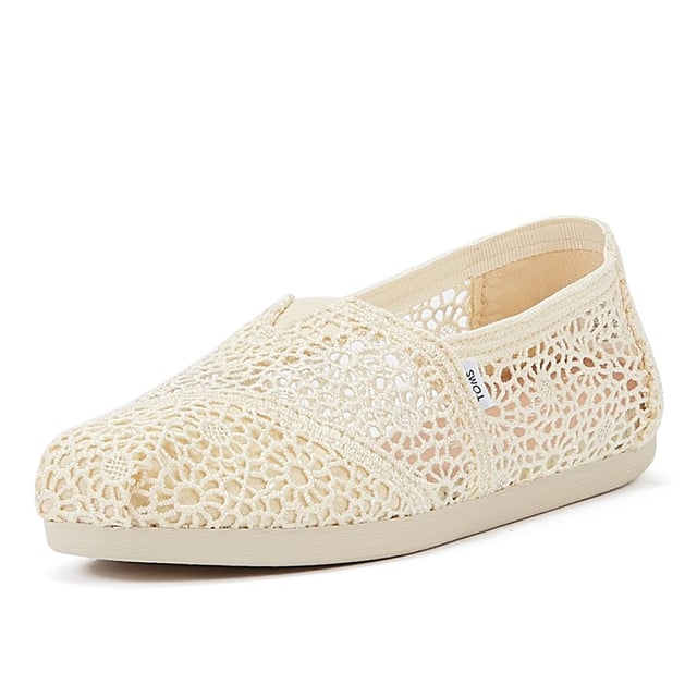 Experience ultimate comfort and style with our exquisite crochet uppers, complemented by the cutting-edge TOMS CloudBound Sole. Crafted to provide exceptional comfort, cushioning, and traction, these shoes are a true delight for your feet. The textile upper is not only trendy but also 100% vegan, making it a perfect choice for conscious consumers. With a removable insole and elastic gore for effortless on-and-off, these shoes are designed to enhance your convenience. Step into a world of comfort and sustainability with our remarkable footwear.