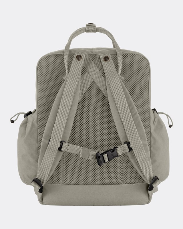 Unisex Kånken Outlong
Introducing a new member of the Kånken family – a slightly more spacious version of everyone’s favourite backpack. In addition to the classic Vinylon fabric, front pocket and Kånken aesthetics, Kånken Outlong has a zippered compartment in its base, large side pockets, and webbing attachment points that can be used for bike lights or other items. The sleeve pocket in the main compartment has a padded base for a laptop and a seat pad. Perfect for commuting, hiking and other outdoor activities. 

Made of Vinylon.  
Sleeve pocket in main compartment with padded base for a laptop and seat pad. 
Zippered compartment in base.
Padded shoulder straps and back panel both with airmesh plus a chest strap.
Inside compartment, Open side pocket(s), Zippered inside pocket(s), Zippered outside pocket(s)
100% Vinylon
do not wash
do not dry clean
do not tumble dry
do not bleach
do not iron
Clean with soft brush and lukewarm water

F23200251