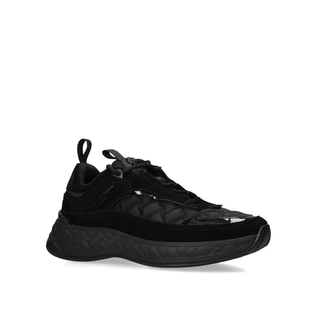 The Kurt Geiger Kensington Sneaker features a black upper in suede, satin and rubber. The tongue features a black branded monocle with black eagle head. Sole height: 4cm.