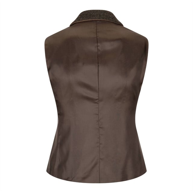 Meticulously crafted to maximise form and function, this women's tweed wool waistcoat is a contemporary spin on a timeless retro classic. With a shaped, tailored design, this waistcoat is made from premium wool with a herringbone pattern and is a perfect accompaniment to formal or casual outfits. Look your best in this timeless classic with this tweed waistcoat that will be a staple of your wardrobe for years to come.