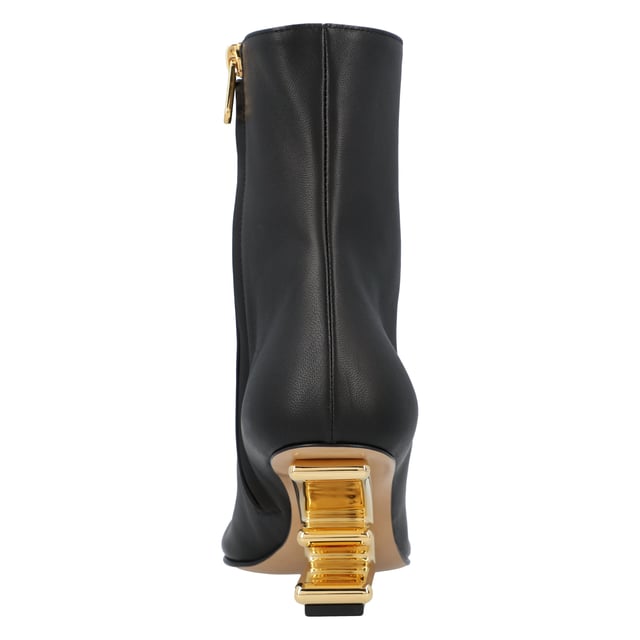 100% Calf Leather 
Made in Italy 
High diagonal F-shaped heel in gold-colored metal.
Heel height: 9.5 cm.
Rounded toe.Measurments:  height: 95 mm