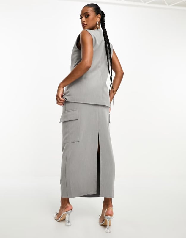 Skirts by Kaiia Part of a co-ord set Top sold separately High rise Pocket details Kick split Regular fitSold By: Asos