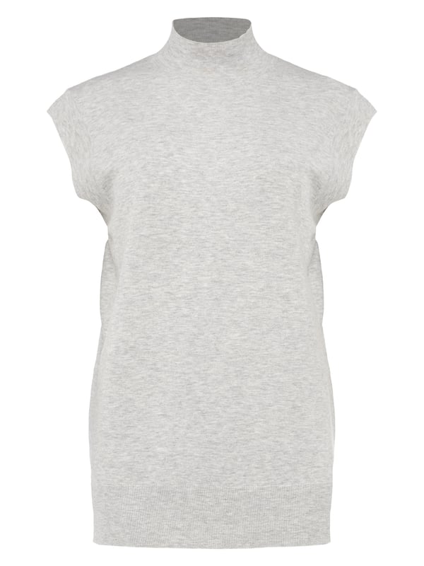 A chic and contemporary separate our fine knit Kitta tank top offers a relaxed take on minimalist elegance. We're styling ours with black jersey culottes and white trainers for an effortless off-duty look.