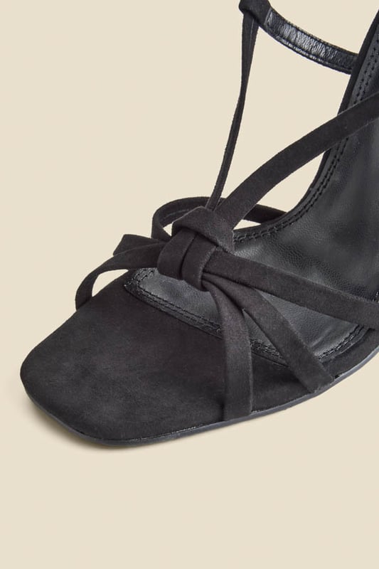 Ready for any occasionTrending square toeSet on a sexy stiletto heel Soft fabric makes them super comfy Adjustable strap for the perfect fitStyle with everything from little black dresses to jeans and a nice top