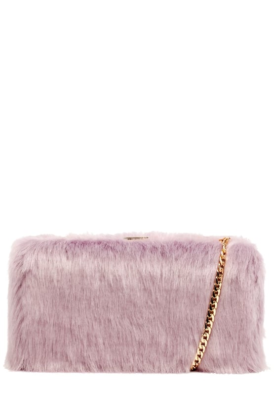 A girls wardrobe is never too full of fabulous bags! Set the trend this season with this funky and tactile faux fur Pandora clutch bag- the must have statement look. Inside is lined with fuchsia twill lining and the handy slip pocket- perfs for your party night essentials! It comes with a fierce detachable gold chain shoulder strap so you can switch up the style to suit whatever outfit you are slayin. Features: , Tactile faux fur exterior, Metal frame and clasp, Detachable chain shoulder strap, Fuschia twill lining, Inner slip pocket Style Ref: 81853 LILAC