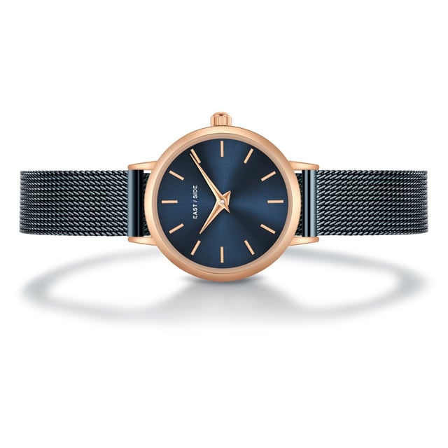 GENERAL INFORMATION:  • Targetgroup: Female  • Wristwatch: No Special Functions  • Display: analogue  • Weight of watch w/o box (gr.) - approx.: 24,0  MOVEMENT:  • Movement: Quartz  • Term of Movement: VC10  • Origin of movement: Japan  BRACELET:  • Material of bracelet/strap: Stainless steel  • Plating of bracelet/strap: Ion-Plating (IP)  • Finishing of bracelet/strap: Smooth  • Finishing/Decoration of bracelet/strap: None  • Clasp/Closure/Buckle: Slide Clasp  • Color of bracelet/strap: Blue  • Length of bracelet/strap (mm) approx.: 190,0  • Width of bracelet/strap (mm) approx.: 9,5  • Style/Design of bracelet/strap: Mesh band (Millanaise Style)  • Bracelet/strap adjustable?: No  CASE:  • Shape of case: Round  • Size/Diameter of case in mm . approx.: 24,0  • Height of case in mm: 7,6  • Case material: Metal (Alloy)  • Surface of case: Polished  • Bezel/Topring: Fixed  • Finishing/Decoration of case: None  • Material of case back: Stainless steel  • Lock of case back: No screwed-in crown  • Color of case: Rosegold  • Coating/Plating (Case): Ion-Plating (IP)  • Type/Form of crystal: Flat  • Material of crystal: Mineral crystal  • Water resistant (ATM): 3  DIAL:  • Size jewelry care cloth: Hour, Minute  • Indices: Line indices  • Material of dial: Brass  • Structure/pattern of dial: Flat  • Color of dial: Blue  PUSHER, CROWN, HAND:  • Pusher: None  • Corrector: No  • Crown: No screwed-in crown  • Type of hands: Dauphine hands  • Luminescent (hands): No  PACKAGING & SCOPE OF DELIVERY:  • Box: Yes  • Service booklet: Yes  • Manual: Yes