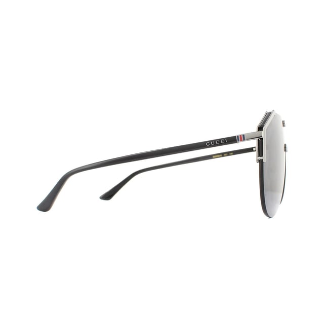 Gucci Sunglasses GG0584S 001 Ruthenium and Black Grey are a bold design featuring one visor aviator shaped lens. Crafted from metal and plastic with adjustable nose pads for comfort. The interlocking GG logo is located front and centre with the Gucci text logo on each temple.