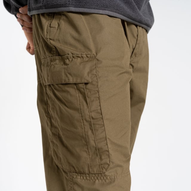 65% Polyester, 35% Cotton. Design: Logo, Plain. Belt Loops, Easy-Care, Heel Tape, Recycled Materials. Fabric Technology: DWR Finish, EcoShield, NosiDefence, SmartDry Eco, Solarshield. Pockets: 5 Zip Pockets, 1 Mobile Phone Pocket. Waistline: Belted Waist, Part Elasticated. No. of Pockets: 9. Conforms to Safety Standard: BCI Approved. Sun Rating: UPF 40+.