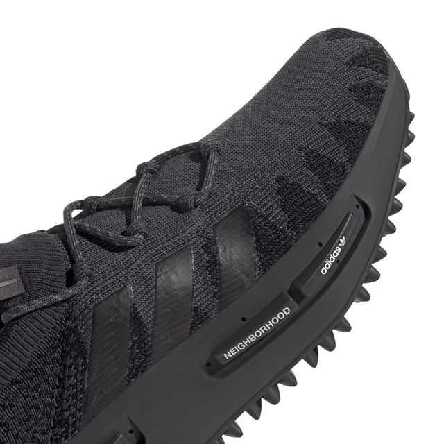Men's adidas Originals NMD_S1 Knit Trainers in Black Designed in collaboration with Tokyo-based NEIGHBORHOOD these shoes keep your daily moves plush and energised. An update of an '80s adidas running icon they pair a breathable knit upper with BOOST cushioning for comfort that lasts as long as you do. Signature NMD midsole plugs a zigzag pattern translucent 3-Stripes and reflective shoe laces are just a few of the unique details of these trainers. A mark of the partnership adidas and NEIGHBORHOOD logos are detailed throughout.Circular knit upper with zig zag pattern.Lace closure.Regular fit.adidas x NEIGHBORHOOD shoes with transparent and reflective details.Translucent TPU 3-Stripes.BOOST midsole.Reflective laces.Rubber outsole.