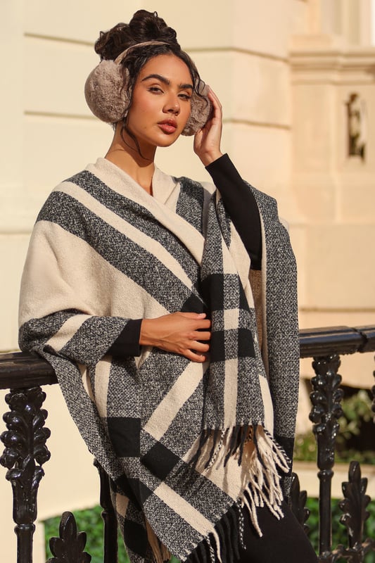 - Check print - Tassel finish - Cape style - One size - Always check the care wash label - Cool hand wash with mild detergent