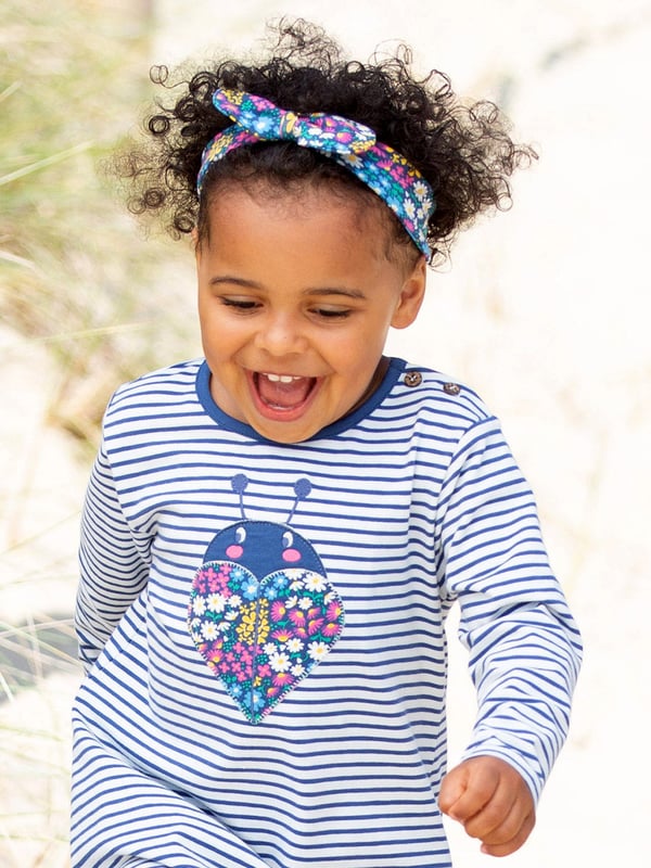 95% organic cotton 5% elastane | Proud to be certified to the Global Organic Textile Standard (GOTS) | Flower patch all-over print | Single jersey with a little bit of stretch (180-190 gsm) | Bow detail | Made in Turkey | Machine washable at 40 degrees, or at 30 degrees to be kinder to the planet