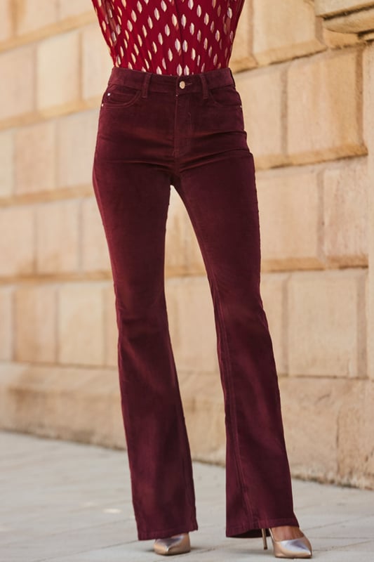 The jeans you never knew you neededKick flare cut makes your legs look so longPlush velvet fabric feels amazingLuxurious wine hueGo cosy with a chunky knit and bootsTake them out-out with strappies and a sparkly topInside leg to fit: Short 29" | Regular 31" | Long 33"