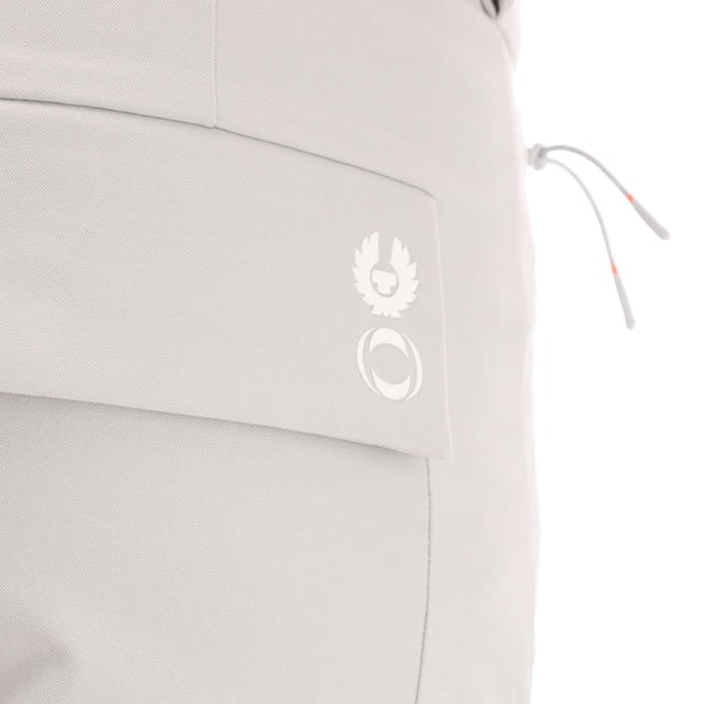 Mens Belstaff Cotton Twill Challenger Trousers in grey.- Front fly fastening with internal hook and bar and jigger button fastening.- Concealed zip pockets with exclusive zip puller.- Concealed zip fastening hip pockets  concealed snap fastening back pocket.- Exclusive America's Cup trims and branding.- Silicone printed Belstaff phoenix on rear pocket with INEOS custom logo.- Mid-rise regular fit.- Outer: 52% Cotton  38% Polyamide  10% Elastane. Pocket lining: 97% Cotton  3% Elastane.- Ref: 105030HRBGY