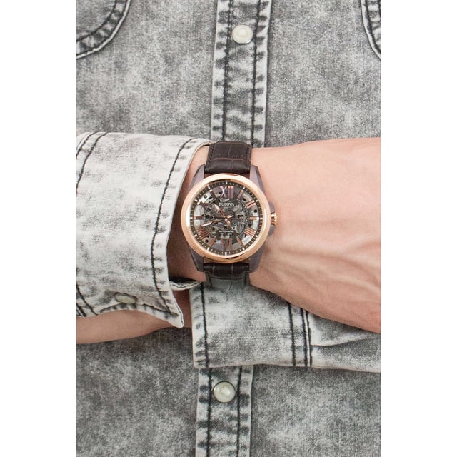 This Bulova Automatic Analogue Watch for Men is the perfect timepiece to wear or to gift. It's Multicolour 43 mm Round case combined with the comfortable Brown Leather watch band will ensure you enjoy this stunning timepiece without any compromise. Operated by a high quality Automatic movement and water resistant to 10 bars, your watch will keep ticking. Get all the comfort with this fashionable croco-embossed leather band, perfect for every occasion High quality 21 cm length, 20 mm wide Brown Leather strap with a Buckle Case diameter: 43 mm, Case height: 12 mm and Case color: Multicolour/Dial color: Multicolour