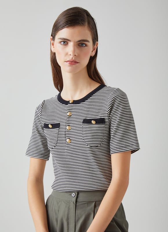 A striped tee is a spring wardrobe must-have, and they don't come cuter than our new Charlie T-shirt. Crafted in Europe from a super-soft cotton with a hint of stretch in black and cream skinny stripes, it has a round neck with a black trim, short sleeves, a half placket of gold buttons, small patch pockets with matching gold button detail, and a classic fit. Tuck it into tailored trousers, a pair of jeans or go really sailor-inspired with shorts.