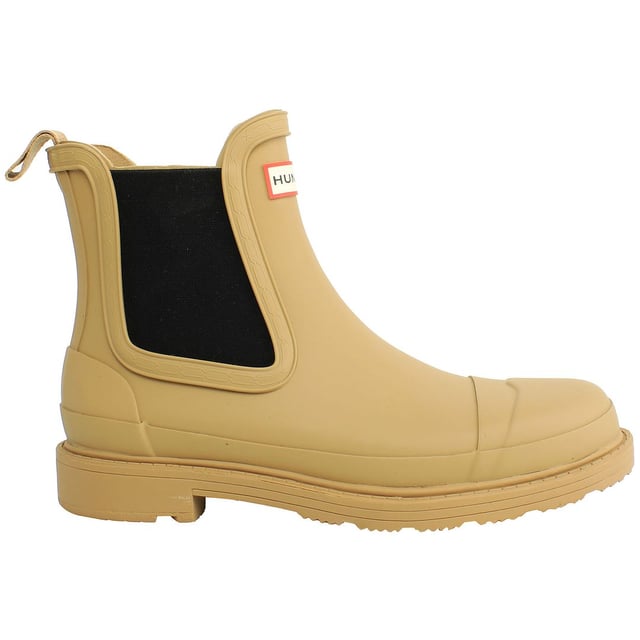 Hunter Commando Women's Brown Chelsea Boots â€“ where rugged sophistication meets urban style. These boots are crafted to seamlessly blend fashion with functionality, providing a versatile and durable footwear option for the modern woman. Here's a detailed description highlighting the key features of these boots:

 Rugged Elegance:  The Hunter Commando Chelsea Boots exude rugged elegance with their brown hue and timeless Chelsea boot silhouette. This versatile color adds a touch of warmth and complements a variety of outfits, making them a wardrobe staple for any season.

 Durable Construction:   Built for the demands of both city streets and outdoor excursions, these boots feature a durable construction that stands up to daily wear. The high-quality materials ensure longevity, making them a reliable choice for various activities and environments.

 Chelsea Boot Convenience:   The slip-on Chelsea boot design offers effortless style and convenience. With elastic side panels and a pull tab, these boots are easy to put on and take off, allowing you to transition seamlessly from casual outings to more adventurous pursuits.

 Comfortable Interior:   Experience all-day comfort with the cushioned insole and breathable lining of these boots. Whether you're navigating city sidewalks or exploring nature trails, the interior design ensures a comfortable and supportive fit for extended wear.

 Versatile Styling:   The rich brown color and classic Chelsea boot design make these boots incredibly versatile. Pair them with jeans for a casual look or incorporate them into your work attire for a touch of rugged sophistication. The Commando boots effortlessly elevate your style in any setting.

 Grip and Traction:   The rugged outsole is designed to provide excellent grip and traction on various surfaces. Whether you're walking on wet pavement or uneven terrain, these boots offer stability and prevent slips, allowing you to move confidently through your day.

 Weather-Resistant Finish:   Navigate changing weather conditions with ease. The weather-resistant finish on these boots ensures they can handle light rain or unexpected drizzles, keeping your feet protected and stylish regardless of the forecast.

Step out in style and confidence with the Hunter Commando Women's Brown Chelsea Boots â€“ a perfect balance of fashion-forward design and practical functionality. From city streets to outdoor adventures, these boots are your go-to choice for a seamless blend of elegance and durability.